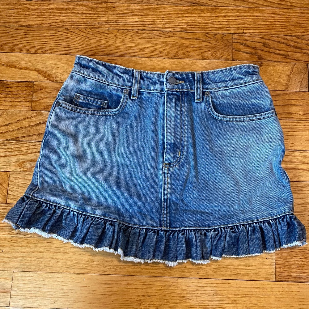 Adorable denim mini skirt with lettuce trim